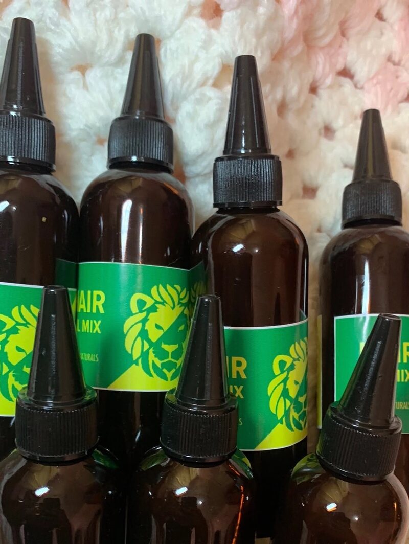 Seven bottles of Mane Naturals Hair Oil Mix